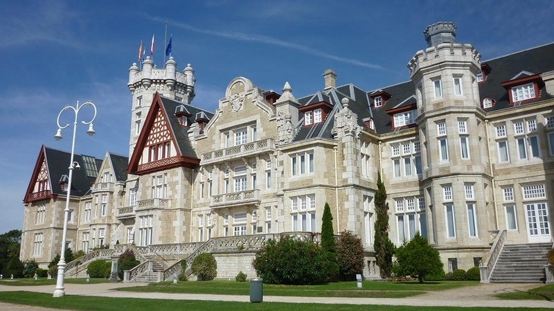 a large stone building with a tower on top of it