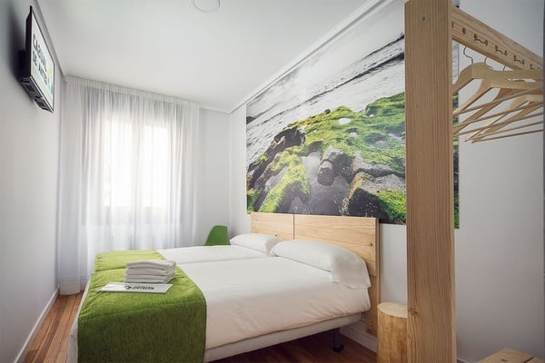 Spacious and bright rooms at Casual Serantes, a hotel with parking in the center of Bilbao