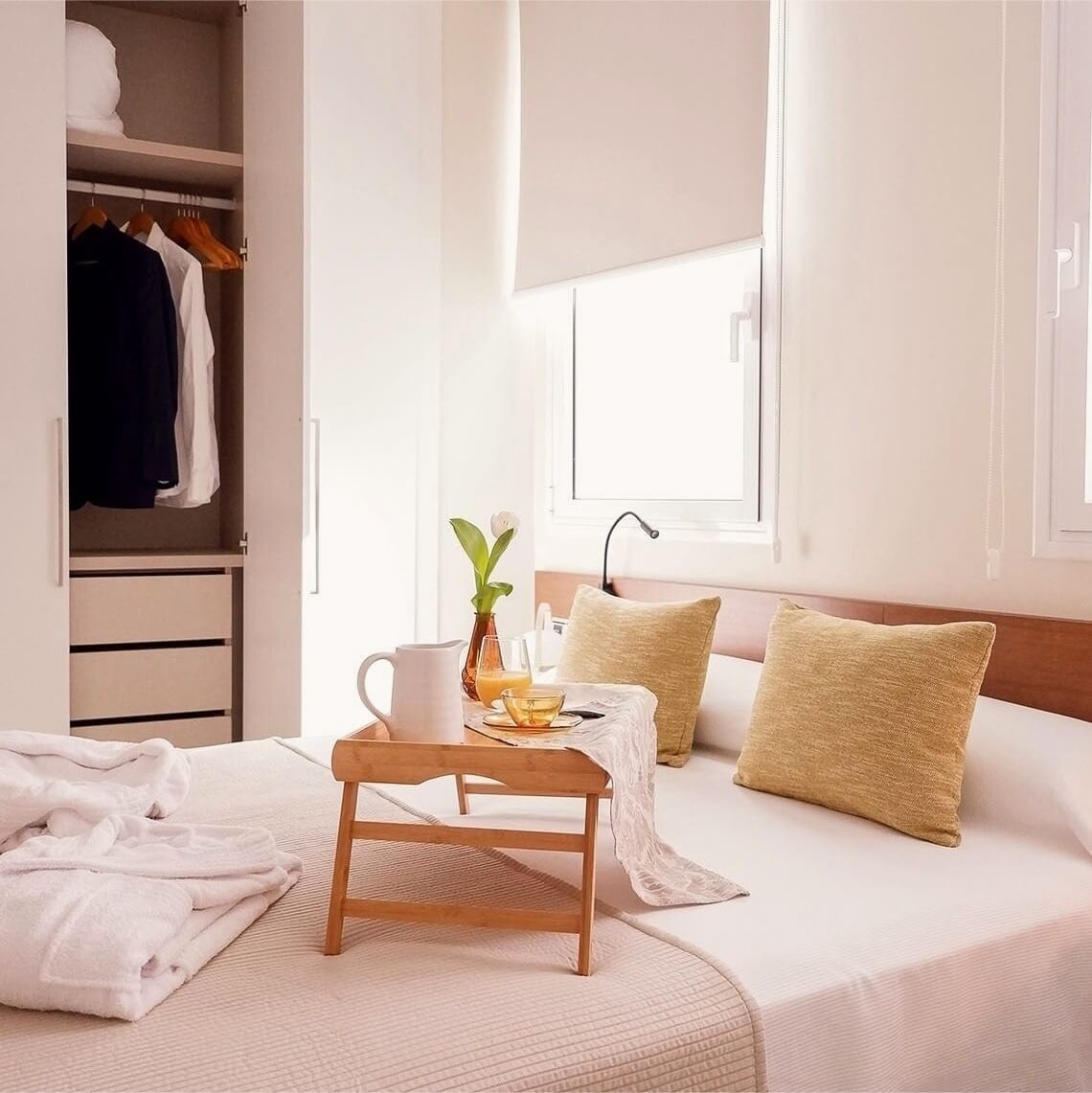Breakfast served on a tray in a comfortable bed. U-Sense