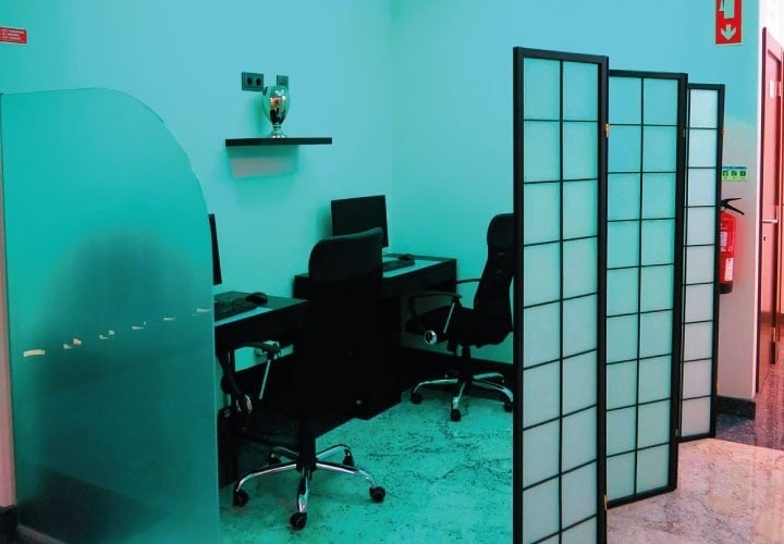 a room with a fire extinguisher on the wall