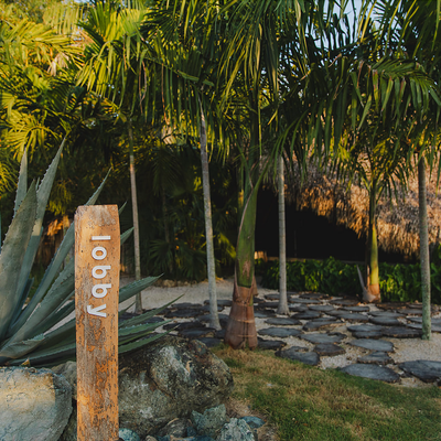 a wooden sign with the word lobby on it