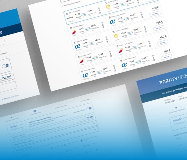 una mujer se sienta en un escritorio frente a una computadora