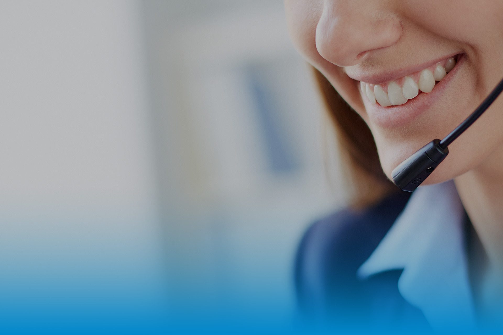 Call center staff working at desks in a modern office, providing customer service. TEST 6