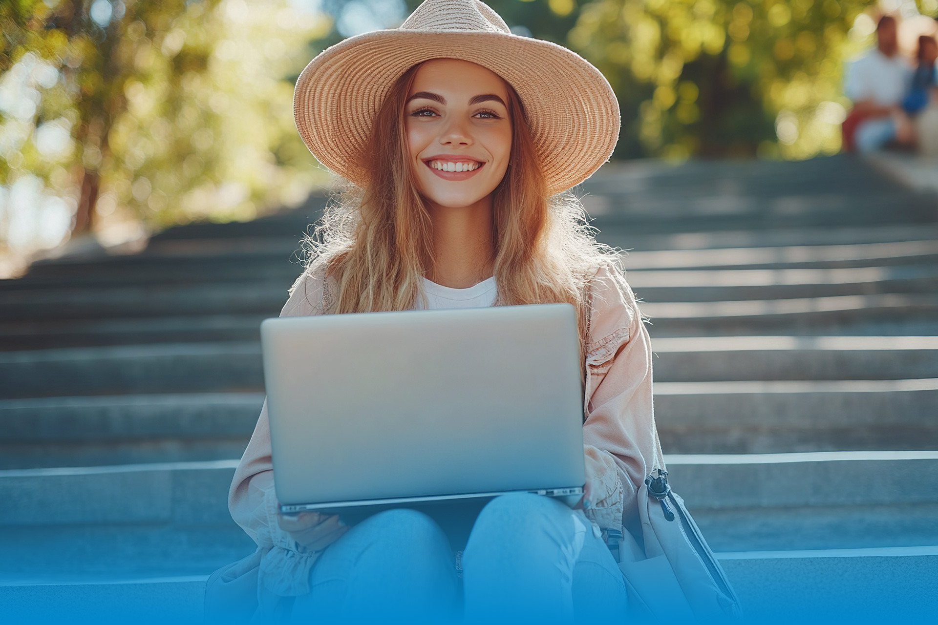 TEST 6: Woman with laptop on stairs, smiling.