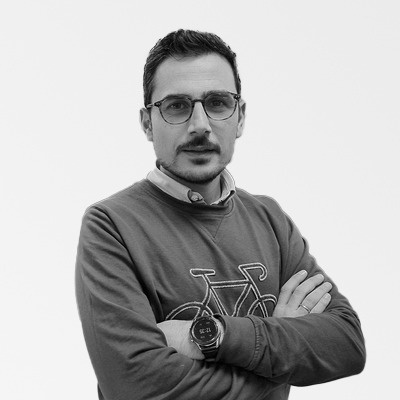 a man wearing a sweatshirt with a bicycle on it