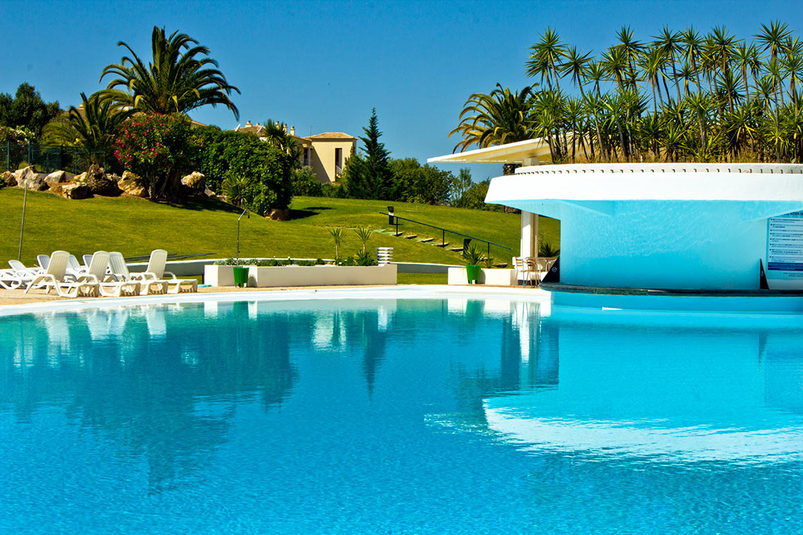 Torralvor beach with golden rocks and reflections. Great for corporate retreats.