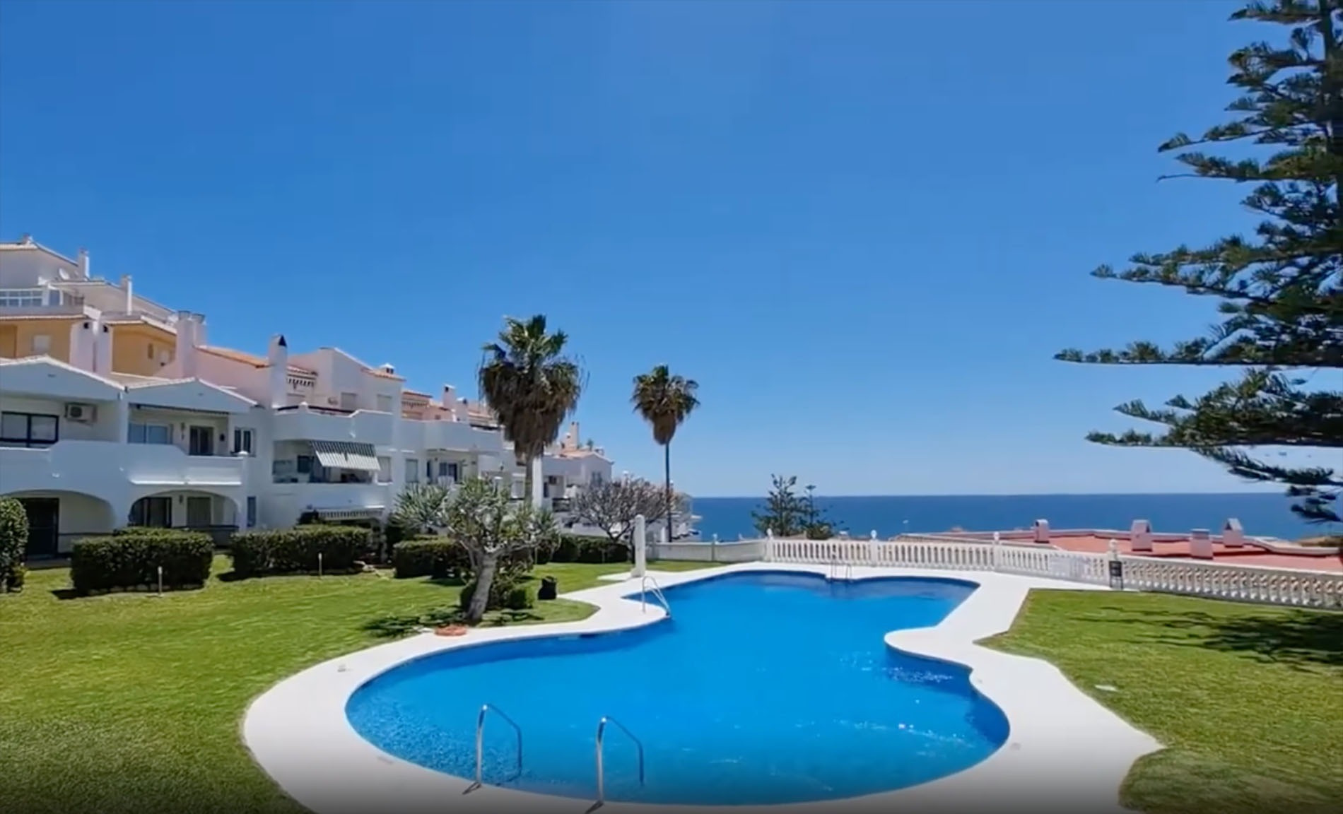 Torrenueva Park complex pool with sea views