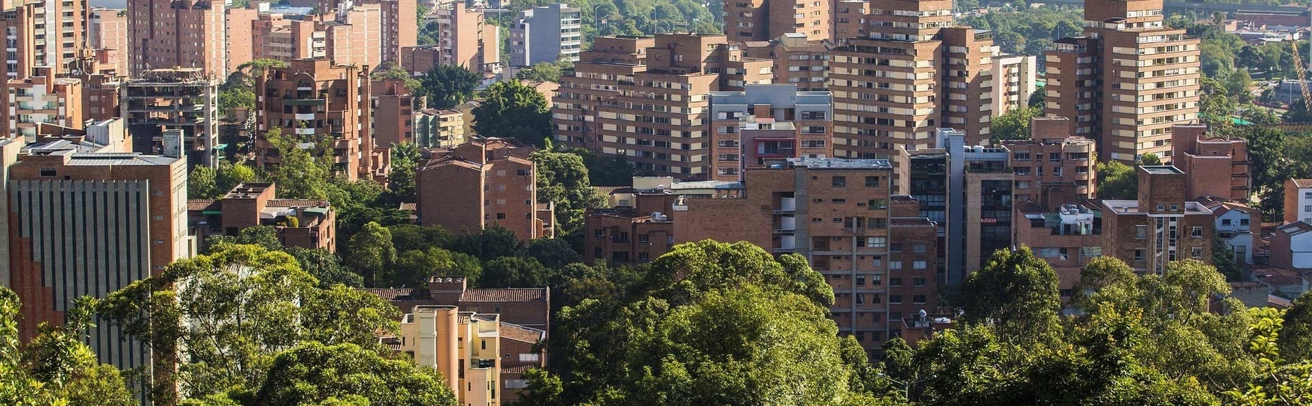 a tall building with a blue sky in the background