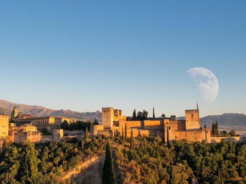 a building with arches and columns in front of it