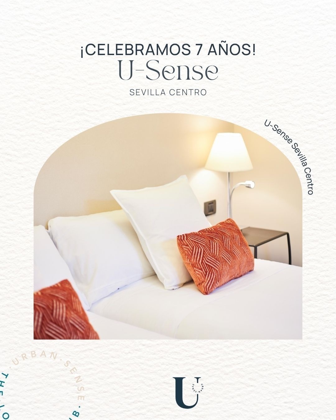 an advertisement for u-sense sevilla catedral shows a living room with a table and chairs