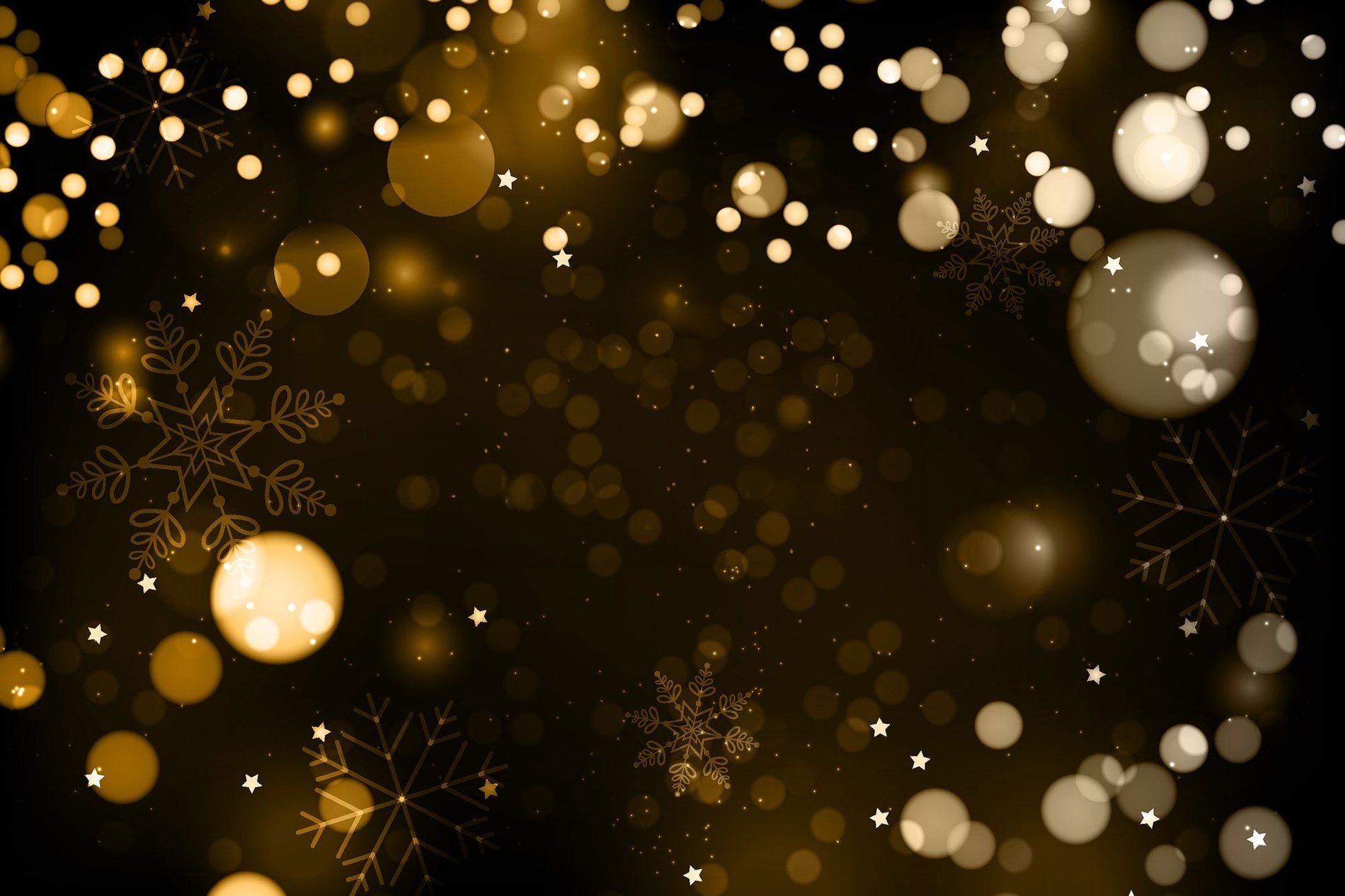 gold christmas decorations on a dark blue background