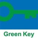 the green key logo is a green key on a blue background .