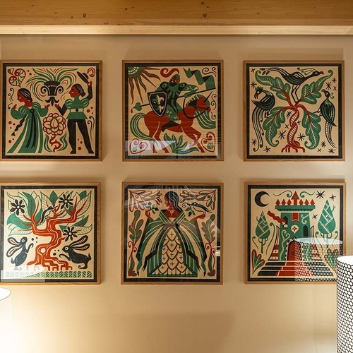 Six modern artworks adorn the wall at Apartamentos Vilafames Antic Palau.
