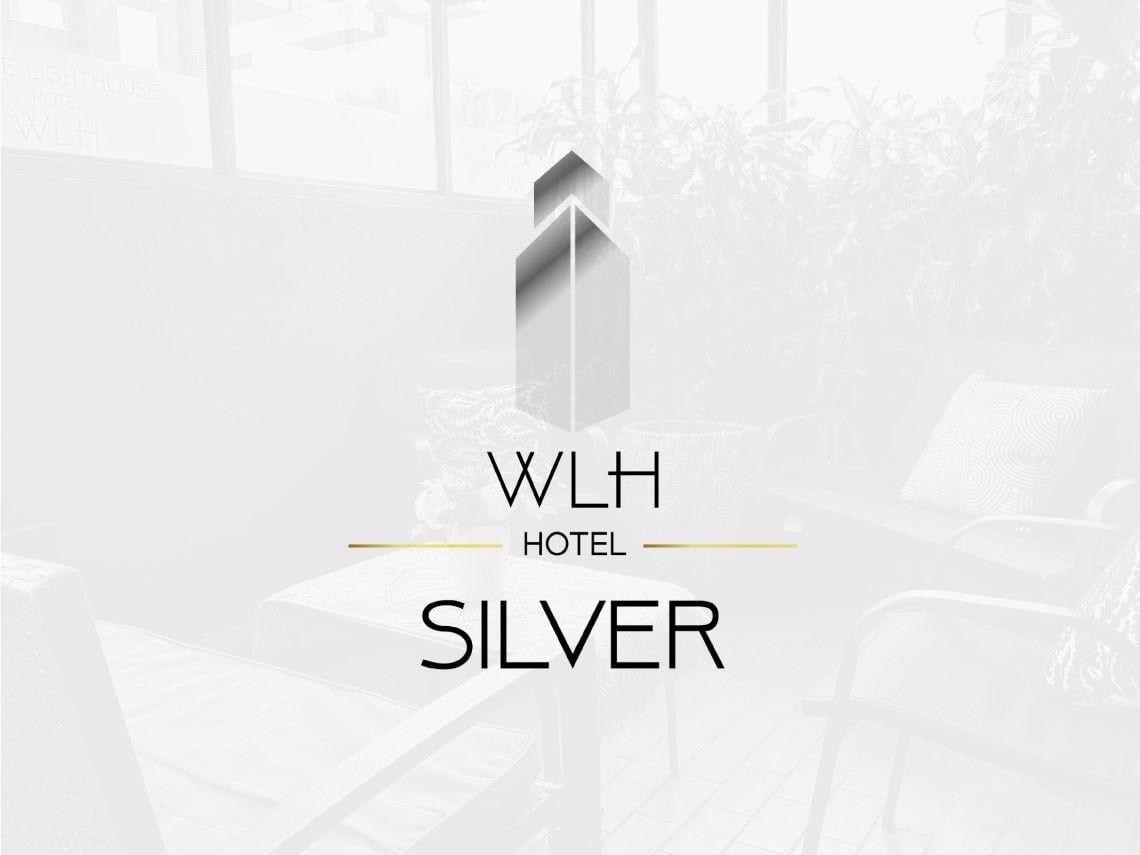 a conference room with tables and chairs set up for a meeting