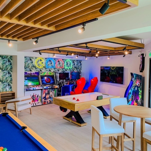 a pool table in a room with a sign that says peace