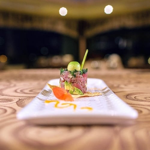 a close up of a plate of food on a table