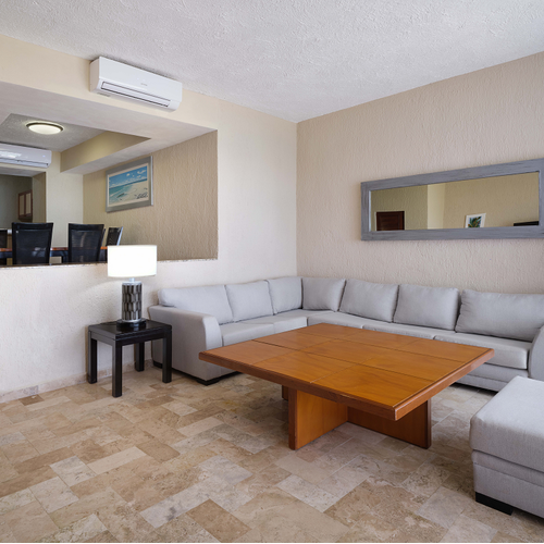 a living room with a couch and a coffee table