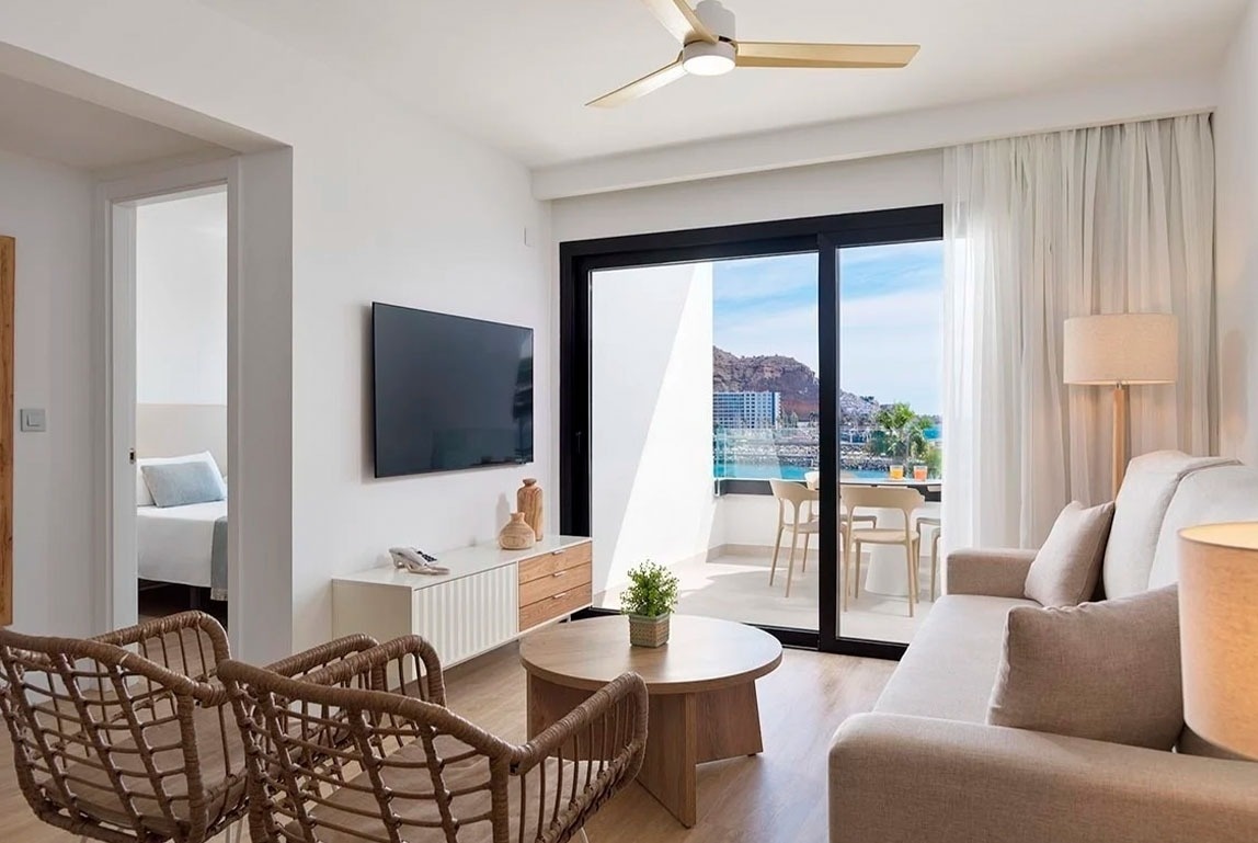 a living room with a couch and a flat screen tv