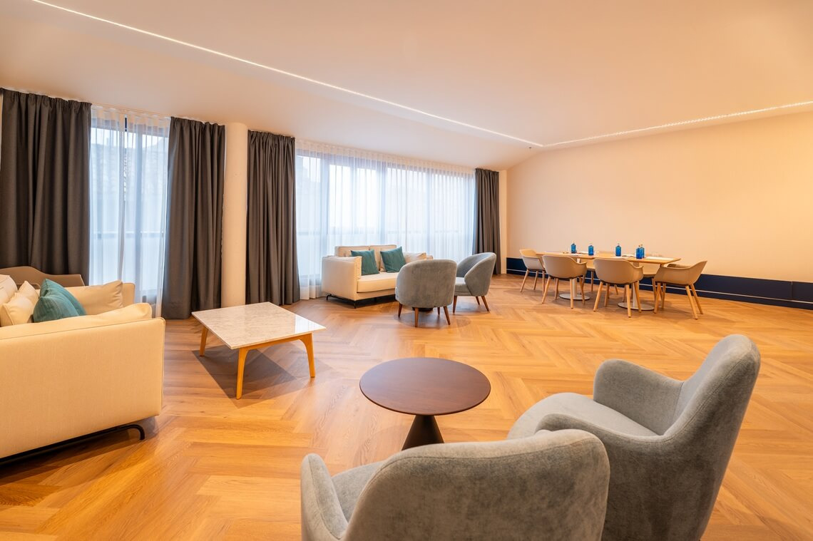 Nautical Lounge Modern conference room with a long table, elegant chairs, and @@Yaramar@@.