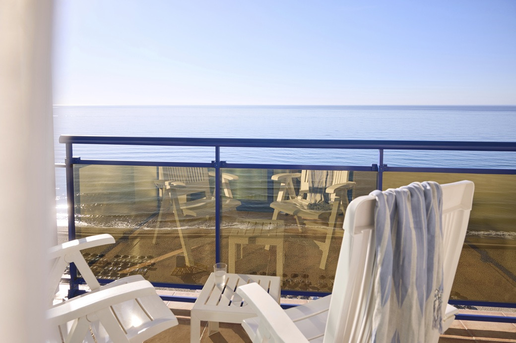 Balcony chairs overlooking the ocean, perfect for Yaramar relaxation.