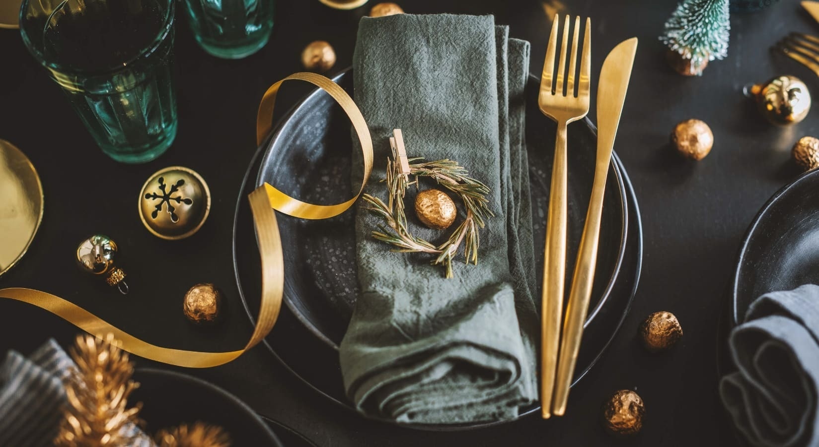 a man is pouring wine into a woman 's glass