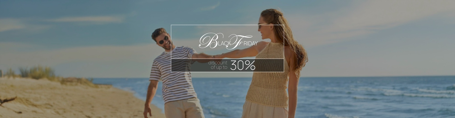 two chairs and a table on a balcony overlooking the ocean