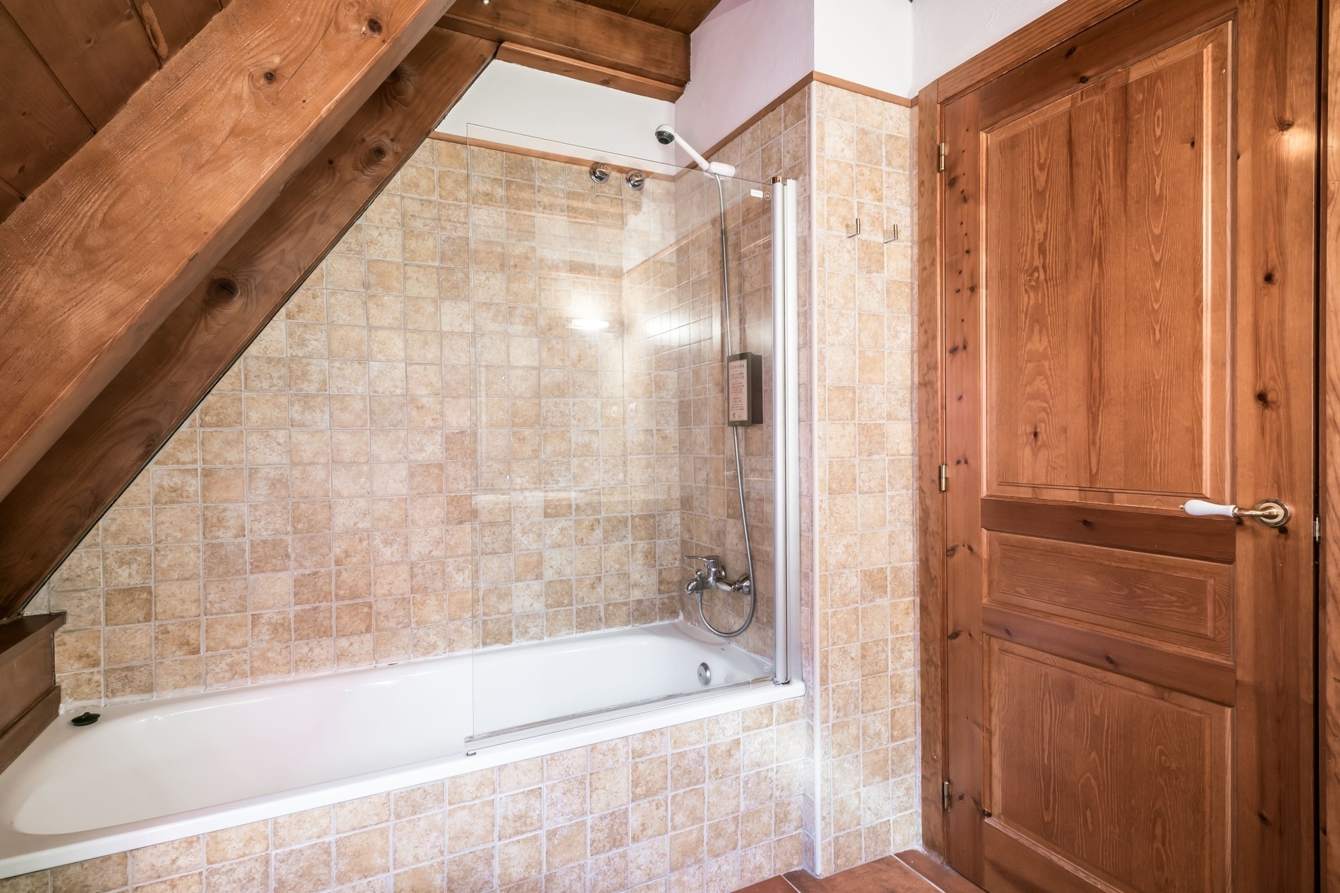 a bathroom with a toilet a sink and a bathtub