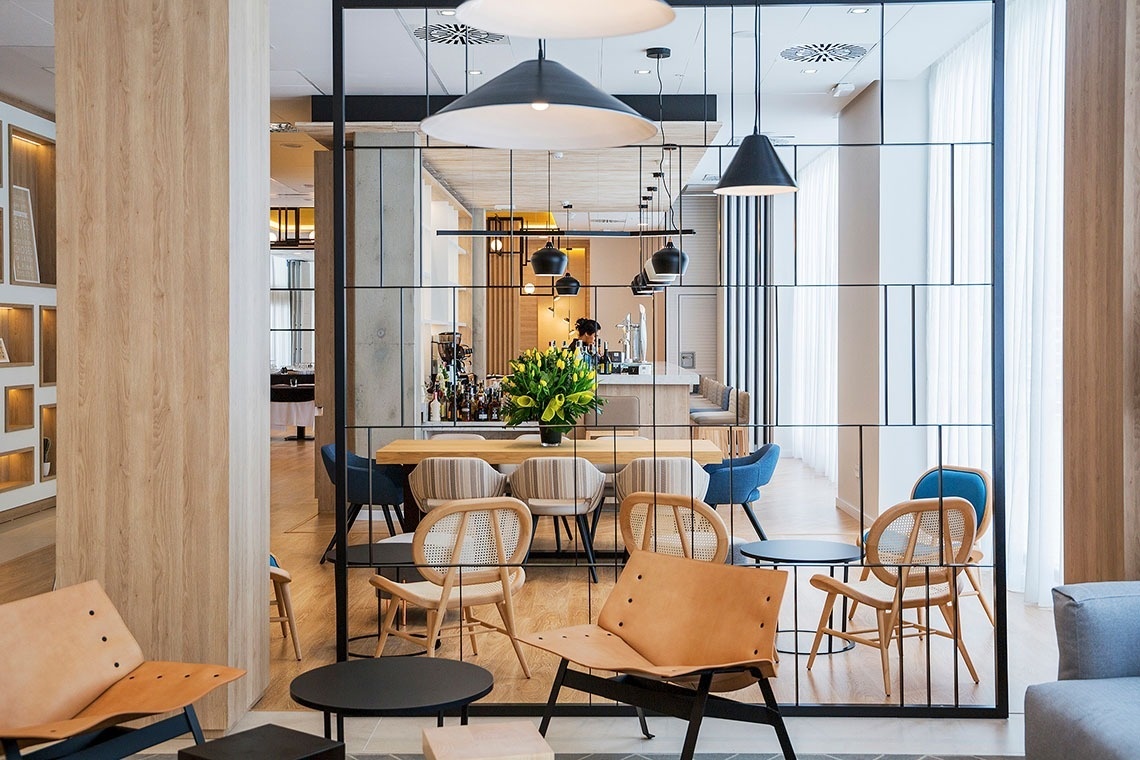 a black plate with a variety of sushi on it