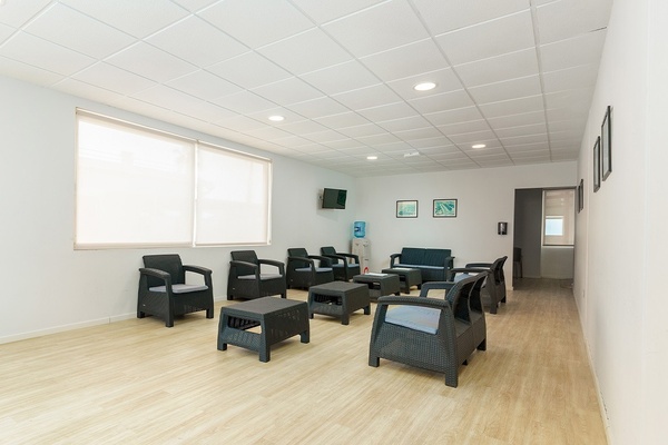 a playground in front of a hotel called the peninsula plaza suites